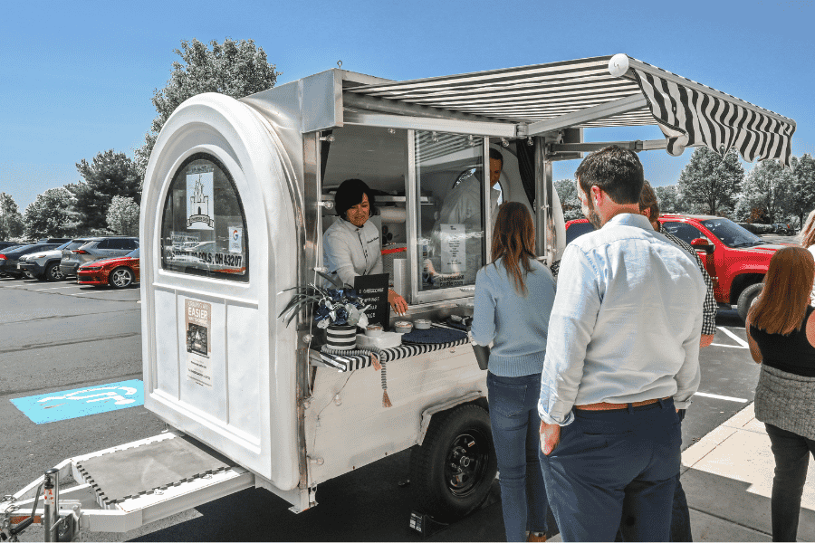 people lined up at food truck