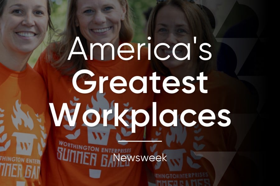 Women smiling in background with text overlay: America's Greatest Workplaces